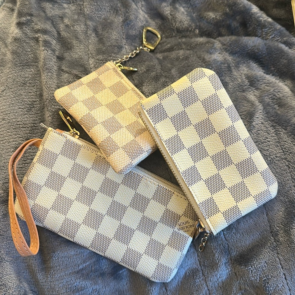 Set of mini wallets and wristlets